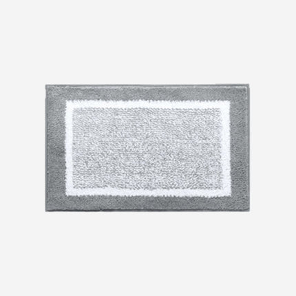 Praktisk grå dørmåtte med hvid kant