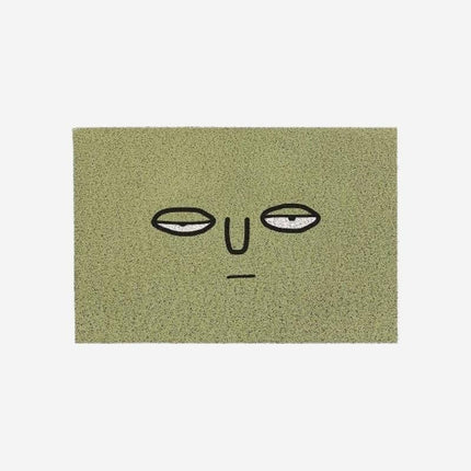 Moderne grøn dørmåtte med ansigt
