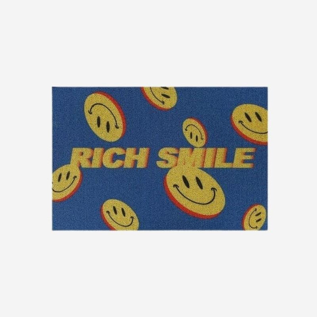 Dørmåtte med 'Rich Smile' design