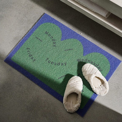 Moderne dørmåtte med ugedage design