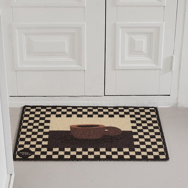 Smart dørmåtte med skaktern og kaffekop