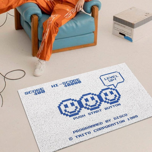 Dørmåtte med retro computerspil design