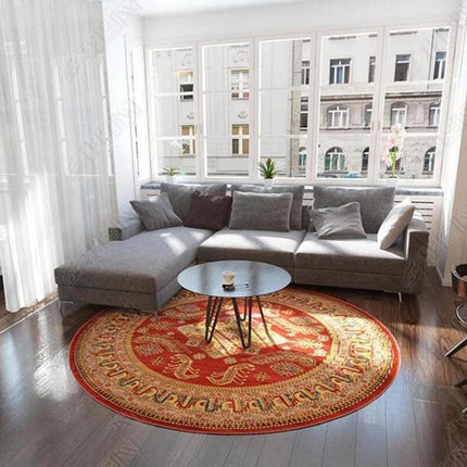 Lille rundt rødt orientalsk tæppe