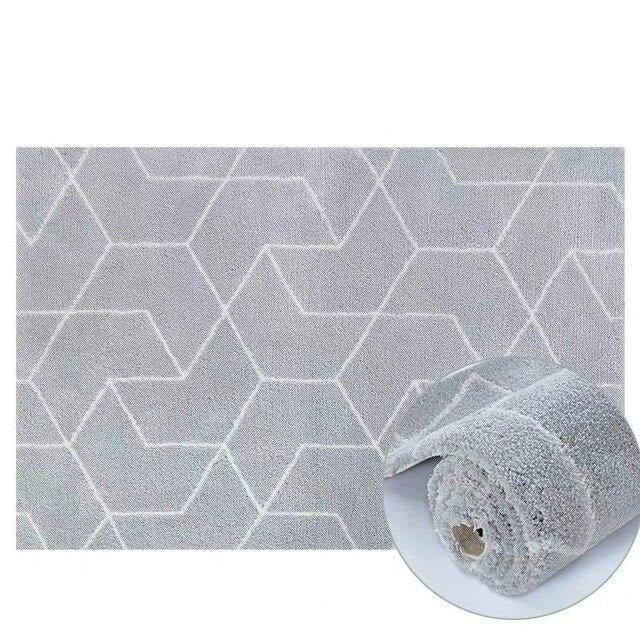 Gråt shaggy tæppe med geometrisk mønster