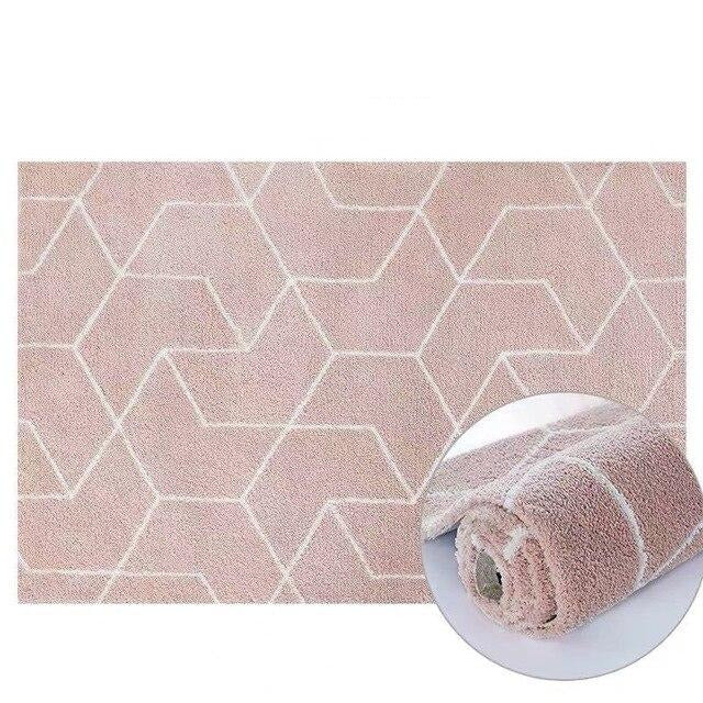 Pudderrosa shaggy tæppe med geometrisk mønster