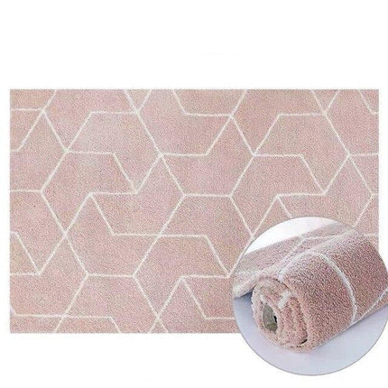 Pudderrosa shaggy tæppe med geometrisk mønster