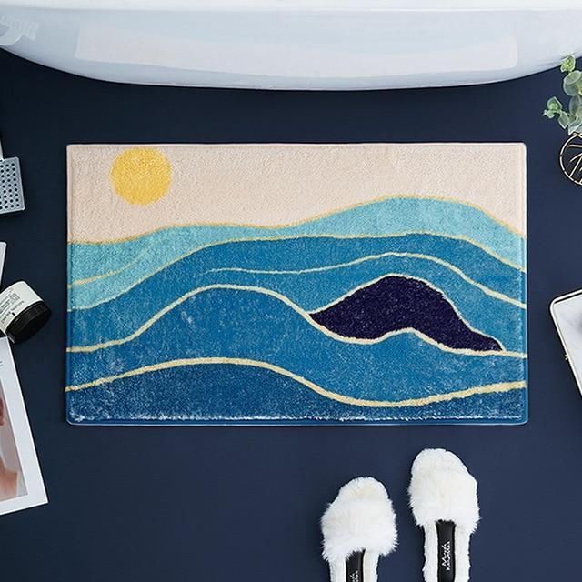 Bademåtte med flot strand og bølge motiv