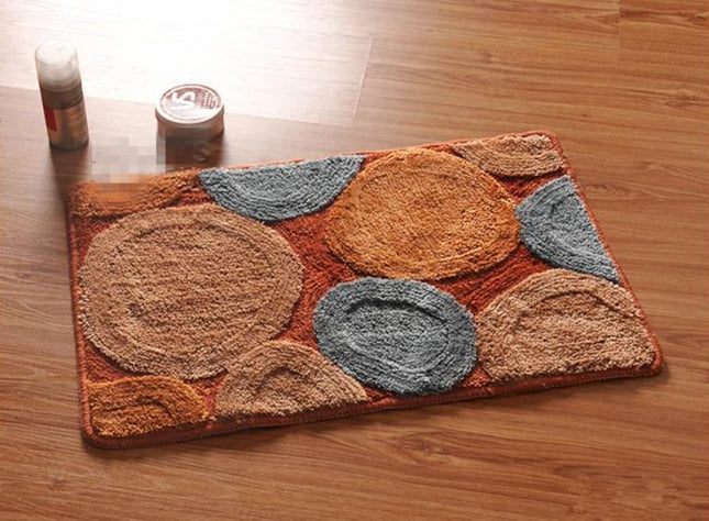 Brun bademåtte med runde sten motiv