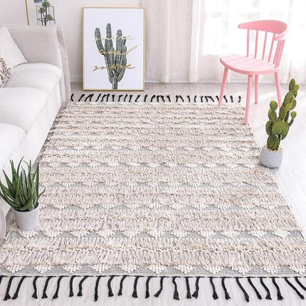 Råhvidt gulvtæppe i berber stil