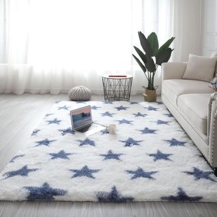 Blødt blåt gulvtæppe med stjerner