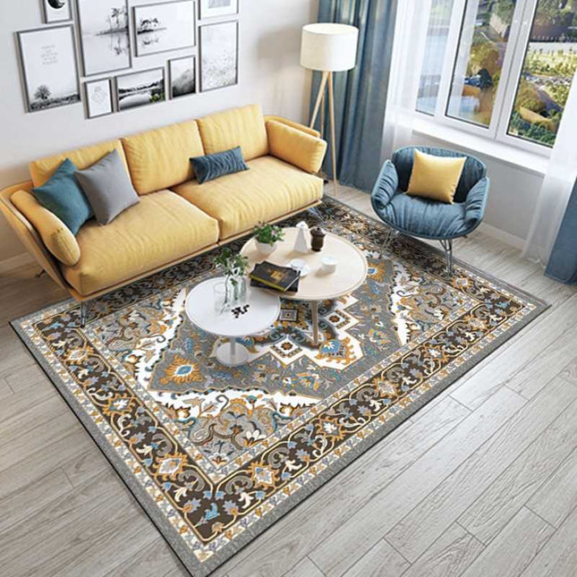 Gulvtæppe med gult og gråt mønster