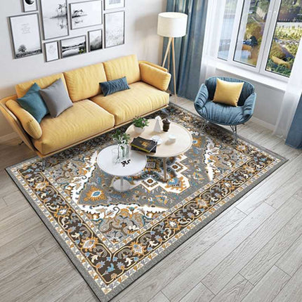 Gulvtæppe med gult og gråt mønster