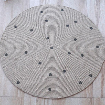 Rundt prikket jute tæppe til børn