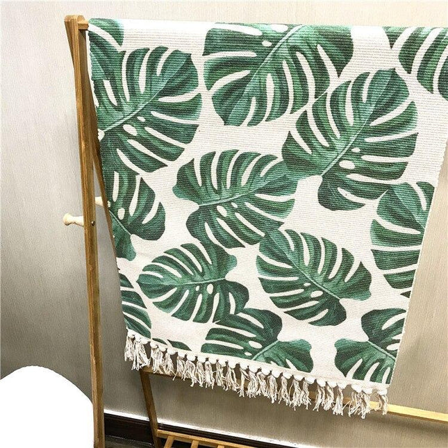 Gulvtæppe med grønt monstera blad mønster