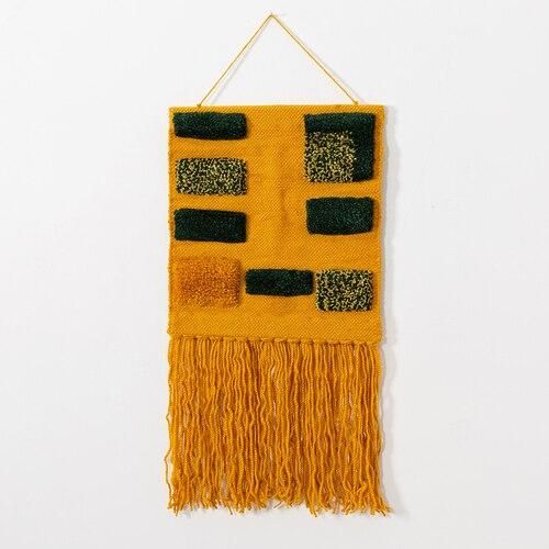 Moderne orange vægtæppe med mønster