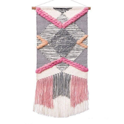 Lyserødt vægtæppe med geometrisk design