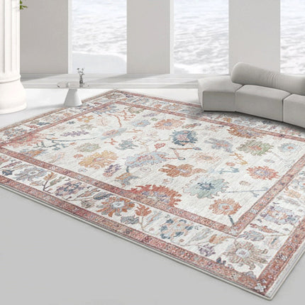 Orange vintage gulvtæppe med blomstermotiv