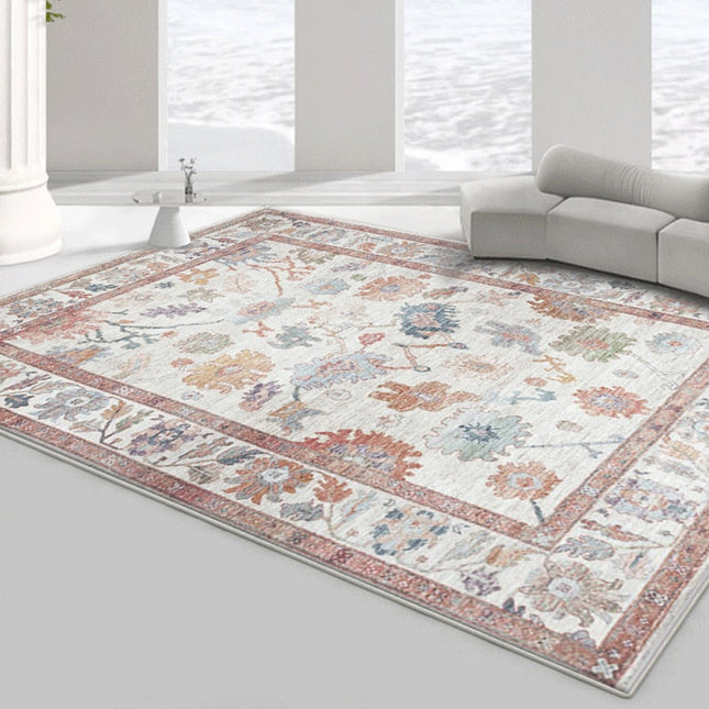 Orange vintage gulvtæppe med blomstermotiv