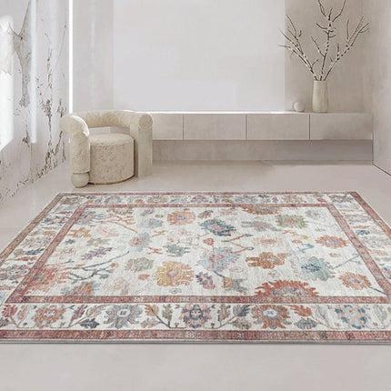 Orange vintage gulvtæppe med blomstermotiv