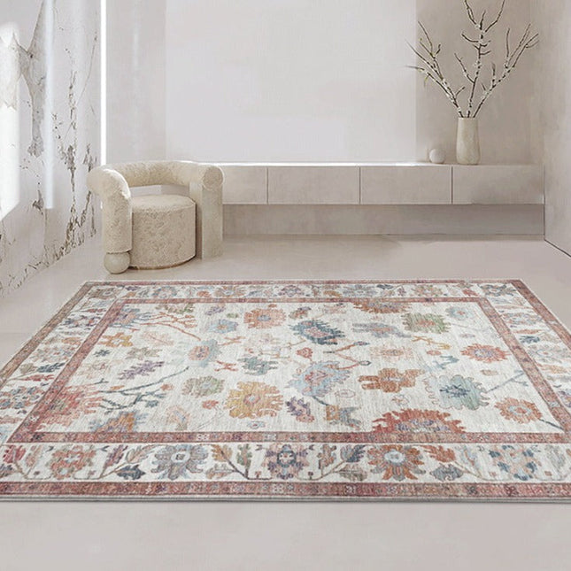 Orange vintage gulvtæppe med blomstermotiv