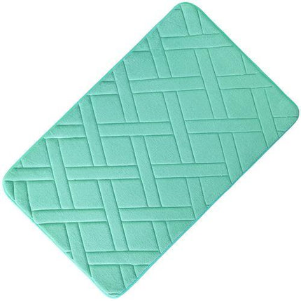 Turkisblå bademåtte med præget mønster