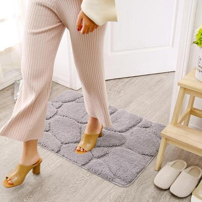 Grå bademåtte med 3D sten motiv