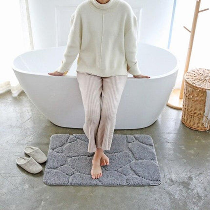 Grå bademåtte med 3D sten motiv