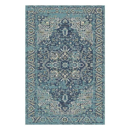 Blåt vintage gulvtæppe i industriel stil