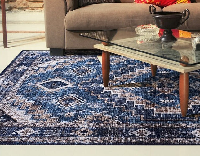 Blåt vintage gulvtæppe med etnisk mønster